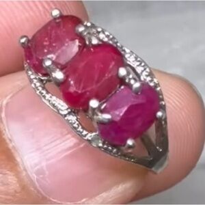925 Sterling’s Silver Ring with 3 Ruby Sones. Size 5